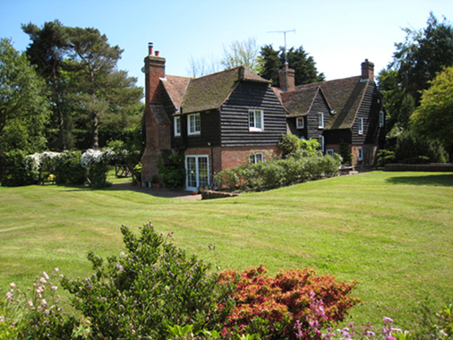 View of the house and gardens at our Rye Bed and Breakfast.